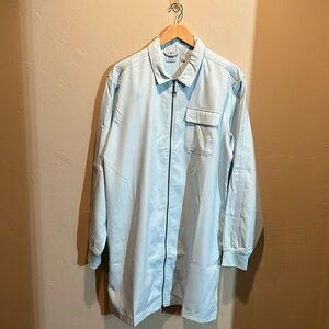 Super cute Adidas contempo dress in almost blue color. Zip front.